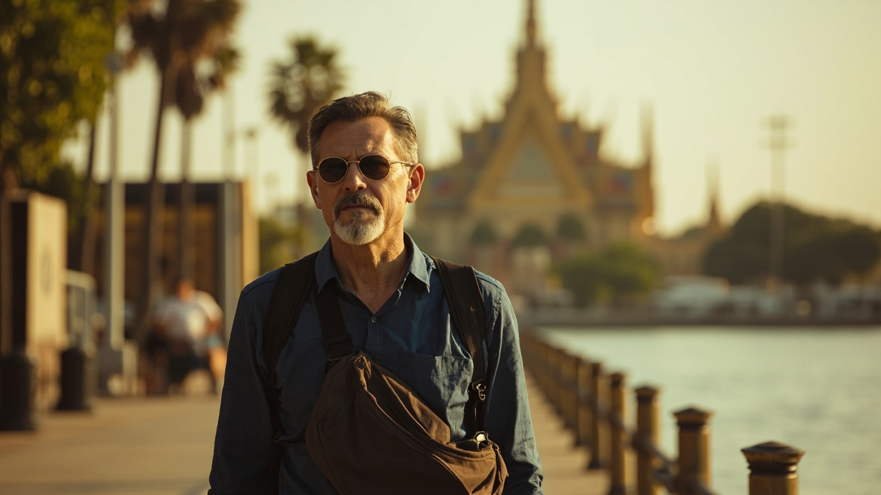 American traveler walking the Phnom Penh riverfront in warm afternoon light, with the Royal Palace spires soft in the background
